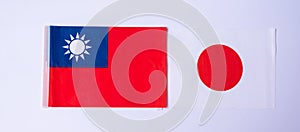 Taiwan against Japan flags. freindship, war, conflict, Politics and relationship concept