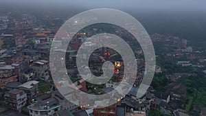 TAIWAN, JIUFEN - MAY, 2023: Aerial drone of old town Jiufen, famous landmark tourist village on the mountain in Taiwan.