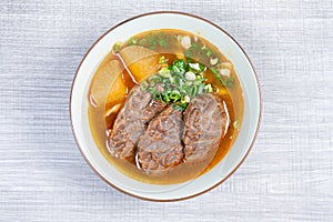 Taiwanese beef noodle soup is a noodle soup dish originating from Taiwan.  top view