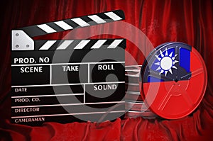 Taiwanese cinematography, film industry, cinema in Taiwan. Clapperboard with and film reels on the red fabric, 3D rendering