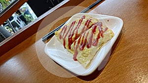 A popular Taiwanese breakfast snack: potato cake with egg photo