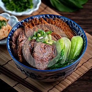 Taiwanese famous food beef noodle on wooden table