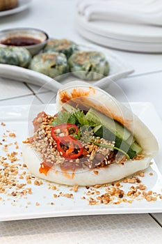 Taiwanese Food Gua Bao, Asian hamburger or sandwich from steamed rice bun with red-cooked pork belly