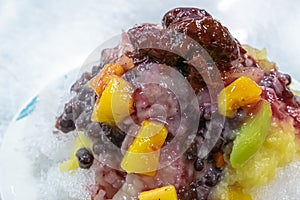 Taiwanese mixed fruit shaved Ice snowflake smoothie at night market in Kaohsiung, Taiwan. photo