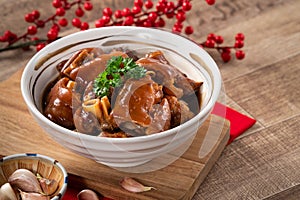 Taiwanese traditional food pork knuckle in a bowl for Chinese Lunar New Year meal