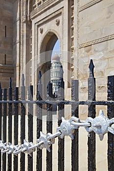 TaJ Hotel through Gateway of India, railings and chains