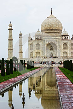 Taj Mahal during a gray and crowded day in Agra