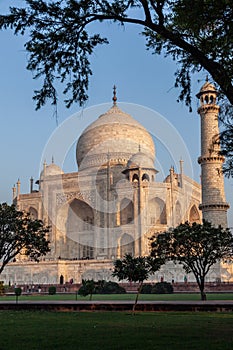 Taj Mahal in morning light with the inscription of the coran in arabic letter meaning in english: This is an invitation to live on