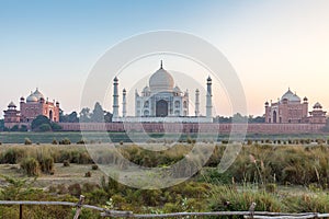 Taj Mahal and outlying buildings as seen from across the Yamuna