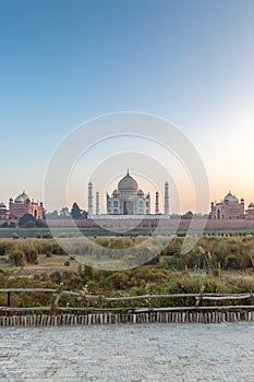 Taj Mahal and outlying buildings as seen from across the Yamuna