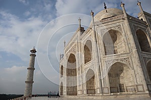 Taj Mahal is a white marble mausoleum on the bank of the Yamuna river in Agra city, Uttar Pradesh state - Image