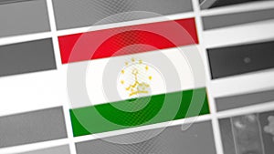 Tajikistan national flag of country.Tajikistan flag on the display, a digital moire effect.