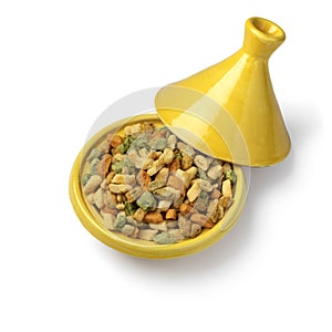 Tajine with colorful miniature shortbread cookies on white background