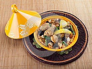 Tajine, moroccan chicken with lemon confit photo