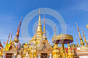 Tak, Thailand - December 24, 2018: Wat Phra Borommathat Temple at Ban Tak distict. The golden Myanmar style pagoda contain Buddha