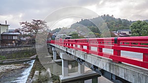 Takayama Gifu Japan skyline time lapse at Nakabashi red bridge and Miyagawa river