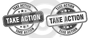 Take action stamp. take action label. round grunge sign