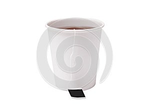 Take-away Cup with tea and black label. Isolated on white. Cardboard disposable Cup with tea bag on white background