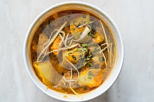 Take Away Indian Food Spicy Masaledar Aloo Gobi with Soybean Sprouts and Beans Tawa Sabzi in Plastic Cup Box Package / Container