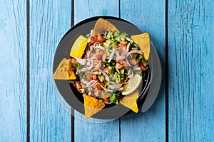 Take Away Mexican Food Pico De Gallo Salsa Salad with Tortilla Nachos, Tomato, Onion, Lime, Cilantro, Parsley, Jalapeno Pepper in