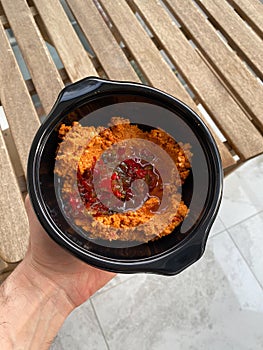 Take Away Traditional Appetizer Muhammara, Acuka or Acika made with Tomato Paste