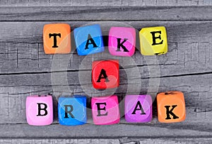 Take a break words on table photo