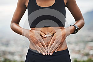 Take care of your health and wellness. Closeup shot of a sporty unrecognizable woman making a heart shape with her hands