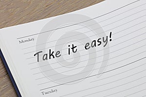 Take it easy reminder message in an open diary