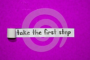 Take the first step text, Inspiration, Motivation and business concept on purple torn paper