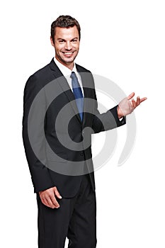 Take his advice. A young businessman gesturing towards something while isolated on white.