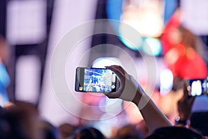 Take photo crowd in front of concert stage