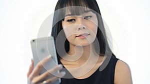 Take a self portrait with her smart phone