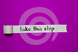 Take this step, Inspiration, Motivation and business concept on purple torn paper