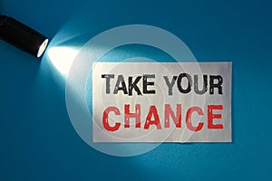 Take your chance - inscription on a white card