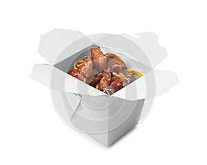 Takeaway box with delicious chinese food on white background photo