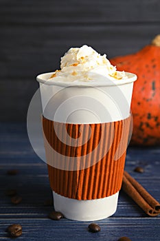 Takeaway paper cup with pumpkin spice latte