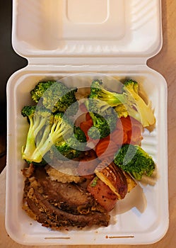 Takeaway  rost Beef dinner with vegetables photo