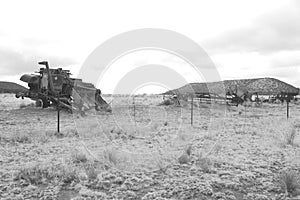 Monochrome view of old farm machinery