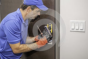 Taking apart a modern deadbolt lock photo