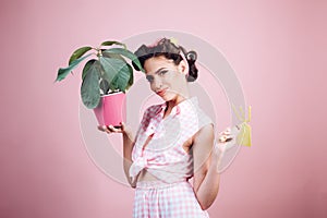 Taking care for environment. greenhouse worker or gardener. pin up woman with trendy makeup. spring. pinup girl with