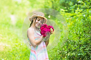 Taking care of nature. happy child in straw hat. Hairstyle of nature. mothers day. happy womens day. Portrait of small