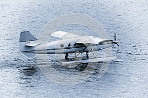 Taking off the small passenger plane.