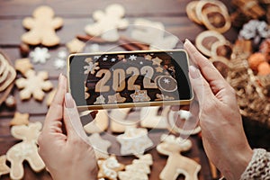 taking photography of gingerbread cookies on phone