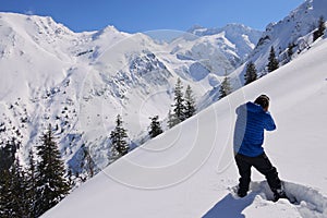 Taking photos in harsh winter conditions in the Transylvanian Alps.