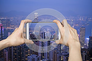 Taking picture of Hong Kong Skylines Cityscape with smartphone