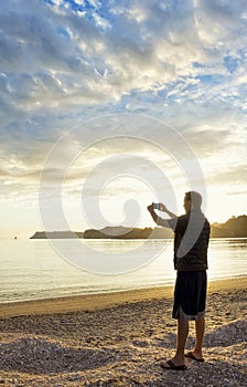 Taking a picture of a Peaceful Morning Sunrise