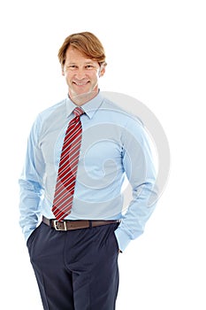 Taking a relaxed approach to business. Studio portrait of a confident mature businessman isolated on white.