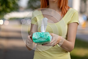 Taking wet wipes from the packaging - hygiene procedure and prevention of infectious diseases