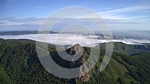 Takmak Rock in the Siberian Stolby Nature Reserve at dawn.