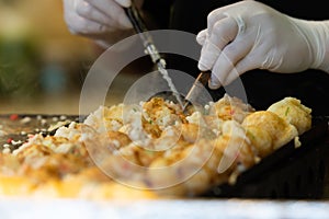 Takoyaki is a most famous Japanese snack food